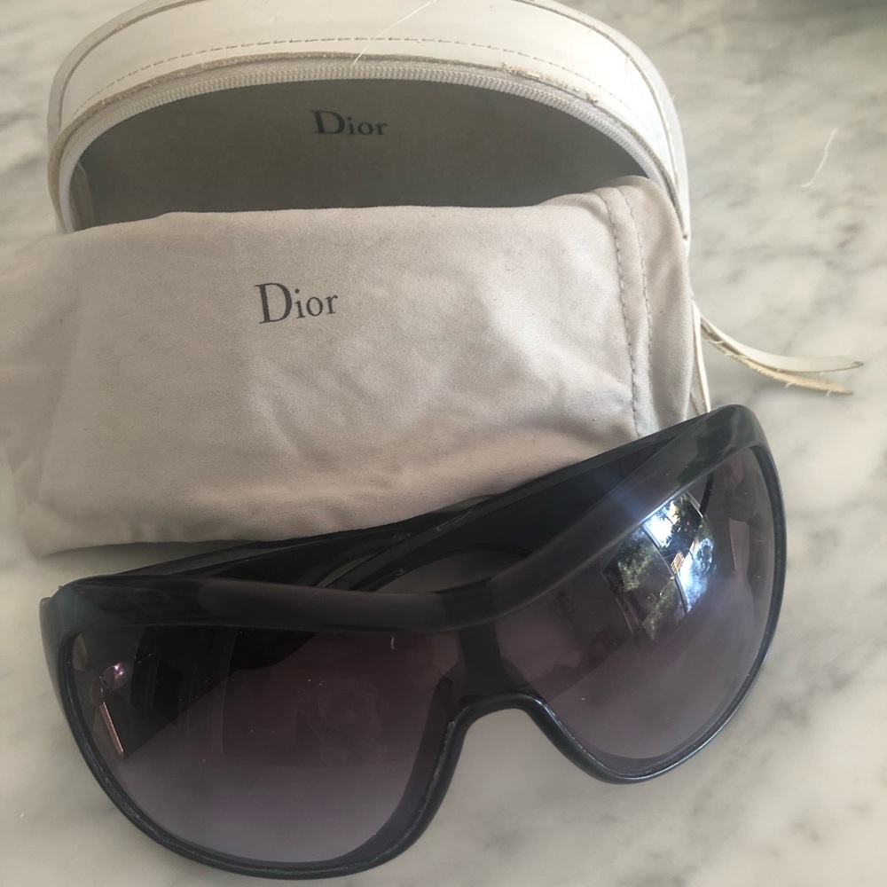 Dior oversized eggplant purple sunglasses.